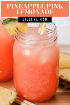 two mason jars filled with pineapple pink lemonade