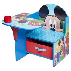 a child's desk with mickey mouse on it