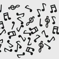 black musical notes are scattered on a white background