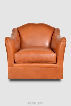 a brown leather chair with an armrest and foot rest on a gray background,