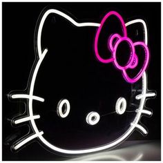 a neon hello kitty sign with a pink bow on it's head and eyes