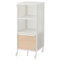 a white shelf with two drawers on wheels