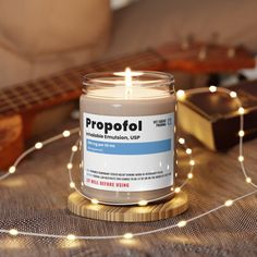 Entertain your colleagues with some vet humor and this Propofol Scented Soy Candle, 8oz. Unique design for everyone in veterinary medicine who loves their profession!  This is perfect for Vet Tech Week, World Veterinary Day, Christmas, Birthday, Mother's day, Father's day, or any other special occasion.Find other cool products for veterinarians, vet techs, veterinary students, receptionists, nurses and anyone involved in the veterinary profession!  .: Materials: 100% natural soy wax blend, 100% cotton wick and a glass jar .: Two sizes:Big 220g wax, 40h burn time = 2.8″ × 3.6" (7.2cm × 9.2cm)Small 130g wax, 20h burn time = 2.4" x 2.4" (6.1cm x 6.1cm) .: Glossy permanent adhesive label .: Available in eight scents - Lavander, Clean Cotton, Sea Salt + Orchid, Vanilla, Caramel, Coffee, Waterme Vet Humor, Psych Nurse, Veterinary Day, Vet Tech Week, Vet Tech Gifts, Pharmacist Gift, Tech Gift, Gifts For Veterinarians, Lavender Candle