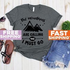 The Mountains Are Calling T-shirt - The Mountains Are Calling And I Must Go Shirt - Hiking - Trailing - Mountain Climbing Tees Shirts 》》》》FAVORITE OUR SHOP TO GET AMAZING DEALS EVERY WEEK!《《《《 Click Below  https://www.etsy.com/shop/GreyisthenewblackCo + Poly/Cotton Blend + Exclusive T-shirt branded unisex tee designed and printed in the USA. + Professionally printed super soft funny and awesome tees. + Our lightweight fitted tees are made from ultra soft ringspun cotton to get that comfortable fit and feel. + Satisfaction guaranteed! + Machine washable (wash inside out in cold water, hang dry, tumble dry low). The Mountains Are Calling T-shirt - The Mountains Are Calling And I Must Go Shirt - Hiking - Trailing - Mountain Climbing Tees Novelty Tops & Tees We have funny tshirt, shirts for wo Christmas In The Mountains, Mountain Shirts, Mountains Shirt, Halloween Tee Shirts, Mountains Are Calling, Mountain Shirt, The Mountains Are Calling, Mountain Climbing, Drinking Shirts