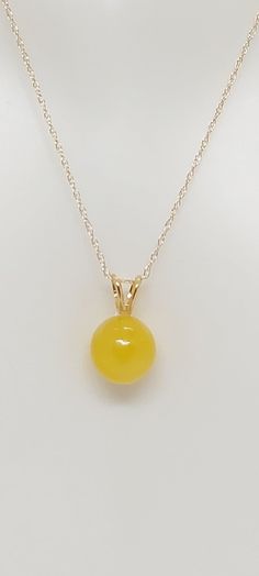 "14K Yellow Gold 8mm YELLOW Jade Pendant, 14K Yellow Gold 18\" Rope chain. Vintage 14K yellow gold Yellow Jade Pendant. JADE LOVER.  Product Info: - Stone: Jade. - Color: Yellow. - Round Jade Measure: 8mm x 8mm. - Metal: 14k Yellow Gold. - Made in USA. - Chain Length: 18 inches Rope Chain. - Nice Gift Box Included." Yellow 14k Gold Round Pendant Necklace, Classic Yellow Necklace With Round Pendant, Classic Yellow Round Pendant Necklace, Yellow Gemstone 14k Gold Necklace, Yellow Gemstone Necklace In 14k Gold, Jade Color, Yellow Jade, Jade Pendant, Rope Chain