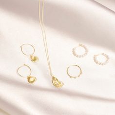 We’re picky about our pearls. Our collection of modern-feel pearl pieces takes your grandmother's favorites and incorporates them into the latest trends, interpreted from our NYC-gal perspective. These gem-quality pearls are freshwater cultured beauties, set in solid 10k gold that won't tarnish or flake. We may have expensive taste, but crazy mark-ups aren’t really our thing. So we balance the best quality and the best price — enough said. 10k Solid yellow gold White freshwater cultured pearl 20 Everyday Elegance Pearl Pendant Jewelry, White Pearl Chain Jewelry For Everyday Elegance, Everyday Elegant Pearl Pendant Jewelry, Gold-plated Jewelry With Pearl Charm, Timeless Gold-plated Jewelry With Pearl Drop, Timeless Gold Plated Pearl Drop Jewelry, Modern Pearl Pendant Jewelry For Wedding, Gold Pearl Jewelry For Everyday Elegance, Timeless Baroque Pearl Jewelry With Pearl Charm