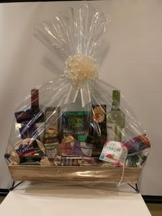 a basket filled with lots of food on top of a table