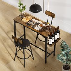 a wooden table with two stools next to it and wine bottles on the table