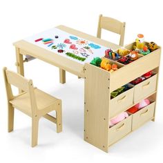 a child's wooden table and chair set with storage drawers on the bottom shelf