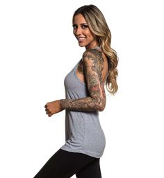 Womens cotton racerback tank top with soft fit body and Sullen badge printed on upper left chest. -100% Cotton body -Imported -Machine Washable Basic Stretch Racerback Tank Top, Basic Crew Neck Tank Top For Workout, Gray Crew Neck Tank Top For Athleisure, Gray Racerback Tank Top For Sports, Gray Scoop Neck Tank Top For Workout, Gym Racerback Tank Top, Gray Moisture-wicking Tank Top, Gray Tank Top For Sports, Moisture-wicking Tank Top