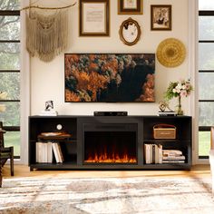 a living room with a fire place and pictures on the wall