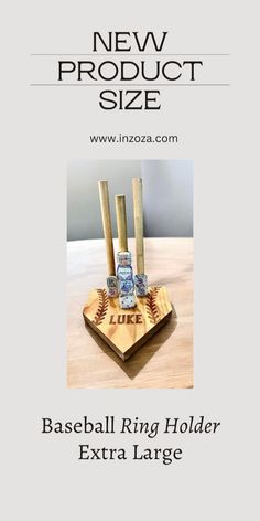 the baseball ring holder extra large is made out of wood and has three bats on it