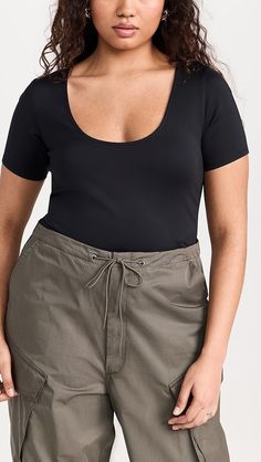 Good American Scuba Scoop Crop Tee | Shopbop Casual Short Sleeve Elastane Bodysuit, Stretch Seamless Short Sleeve Scoop Neck Top, Summer Scoop Neck T-shirt In Elastane, Casual Scoop Neck Seamless Short Sleeve Top, Casual Seamless Short Sleeve Bodysuit, Casual Scoop Neck T-shirt, Good American, Crop Tee, Size Clothing