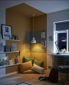 a living room with yellow walls and furniture