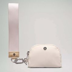 Brand New Lululemon Dual Pouch Wristlet In The Color: Trench & White Opal. Lululemon Dual Pouch Wristlet - Trench & White Opal Gorgeous Rare Sold Out Color! Limited Edition From This Summer! Size: 11.5cm X 0.5cm X7cm (4.5" X 0.2" X 2.8") Lululemon Athletica Brand New With Tags! Others Have Listed For Much Higher! But I'm Happy To Negotiate! Send Me An Offer Lululemon Dual Pouch Wristlet Detachable Pouches Let You Customize The Look And Function Use Pouch As Standalone Wallet Pouch Dimensions: 11.5cm X 0.5cm X7cm (4.5" X 0.2" X 2.8') Pouch: 100% Recycled Nylon Lining: 100% Recycled Polyester Spot Clean Do Not Wash Do Not Bleach Do Not Tumble Dry Do Not Iron Do Not Dry Cle Everyday White Bag With Wrist Strap, White Wristlet With Key Leash For Everyday Use, White Wristlet With Zipper Closure, White Opal Lululemon, Lululemon Dual Pouch Wristlet, Lululemon Dual Pouch, Dual Pouch Wristlet, Double Zipper Pouch, Lululemon Bags