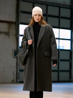 This is a single-breasted long coat with a medium boyfriend fit. A slit at the back allows for comfortable movement, and the use of natural wooden buttons with the brand logo engraved adds a luxurious mood. Maintains warmth using wool blend materialPractical with flap pocket and inner pocketBrand logo silver wappen attachedAvailable in 2 colors: Charcoal, Black*The color of the product may vary depending on the resolution and calibration settings of the monitor and device being used. Wooden Buttons, Charcoal Black, Millet, Boyfriend Fit, Long Coat, Wool Coat, Flap Pocket, Single Breasted, Brand Logo