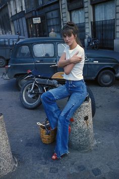 top: white crop top tshirt jeans: Madewell flares shoes: (her) red strappy heels ~ (me) brown 70s wedges Emma Chamberlain, Woman Sitting, Bohol, 1960s Fashion