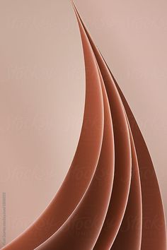 an abstract background with wavy lines in shades of brown and pink by jodi lenski for stocksy photography