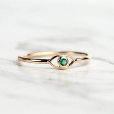 Round Cut Diamond Ring, Emerald Gemstone Ring, Yellow Gold Evil Eye Ring, Solid Gold Bezel Set Ring, Custom Gemstone  Ring, Dainty Handmade Jewelry Gift, Protection Ring For Women, Good Luck Ring, Tiny Diamond Third Eye Ring, Birthday Gift, Christmas Jewelry,  Good Luck Nazar Ring, May Birthstone Ring, Minimalist Jewelry For Her ✤ 𝐂𝐄𝐍𝐓𝐄𝐑 𝐃𝐈𝐀𝐌𝐎𝐍𝐃: ↦ Shape: Round Cut ↦ Color: Birthstone ↦ Carat Weight: 0.10 Carat ↦ Stone Size: 3.00 MM ↦ Stone Type: Gemstone Diamond ↦ Polish/Symmetry - Evil Eye Ring Gold, Protection Ring, May Birthstone Rings, Bezel Set Ring, Evil Eye Ring, Ring Emerald, May Birthstone, Rose Jewelry, Tiny Diamond