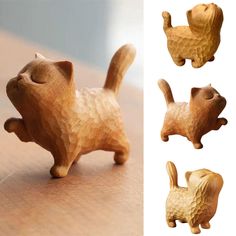 wooden cat figurines sitting on top of a table next to different angles and shapes