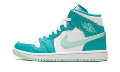 The Women’s Air Jordan 1 Mid “Washed Teal” is a fun and vibrant take on the iconic basketball sneaker.  This shoe features an all-leather makeup, starting off with a white underlay and two tones of green, Washed Teal and Mint Foam, across the upper.  Rounding out this sneaker is a white-on-white tongue and lace combo, and a white midsole paired with a Mint Foam rubber outsole. Womens Air Jordan 1, Logo Wings, Womens Air Jordan, Teal Shoes, Nike X Travis Scott, Preppy Shoes, Womens Air Jordans, Cute Nike Shoes, Nike Dunk High