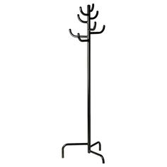 a black coat rack with three branches on it