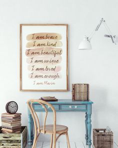 a desk with a chair and a clock on top of it in front of a white wall