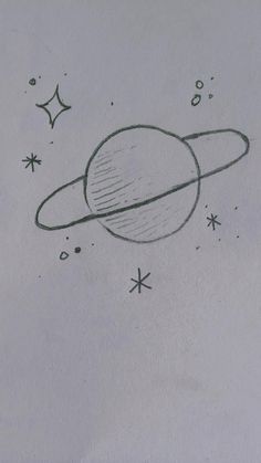 a drawing of the planet saturn drawn on paper with stars and moon in the background