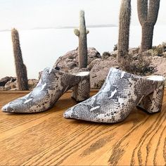 Beautiful Light Gray Heeled Mules By Marc Fisher. New In Box. Size 7.5. The Pointed Toe Fragni Mule Is Designed With A Contemporary Snakeskin Embossed Silhouette That's Sure To Bring A Glam Vibe To Any Outfit. Sizing: True To Size. M=Standard Width - Pointed Toe - Covered Vamp - Snakeskin Embossed Upper - Slip-On - Lightly Cushioned Footbed - Mule Back - Covered Block Heel - Approx. 3" Heel - Imported Materials Synthetic Upper, Manmade Sole Fall Heels With Textured Sole And Pointed Toe, Gray Closed Toe Heels For Fall, Snake Print Pointed Toe Heels Medium Width, Snake Print Heels With Pointed Toe, Chic Gray Pointed Toe Heels, Gray Leather Heels With Medium Width, Gray Leather Heels Medium Width, Chic Gray Boots For Spring, Chic Gray Spring Boots