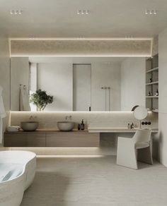 a large bathroom with two sinks and a bathtub