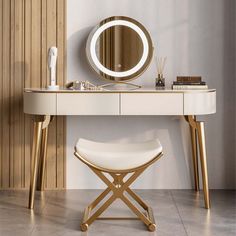 a dressing table with a mirror and stool