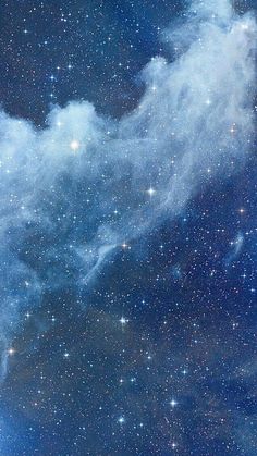 the night sky is filled with stars and clouds