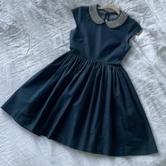 Kate Spade Denim Jeweled Collar Dress. Size 2. All Jewels Intact. No Wear & Tear, Looks Brand New. Only Worn A Couple Times. One Of My Favorites But No Longer Fits. Cap Sleeves, Pockets & Side Zipper. Dry Cleaned, No Odors Or Stains. From A Nonsmoking Home. I’m 5’9 And It Hit Above The Knee. Larger Kate Spade Tag Fell Off During Dry Cleaning But Had The Lower Inside Care Tag. Denim Blue Spring Party Dress, Spring Party Denim Blue Dress, Elegant Sleeveless Denim Mini Dress, Blue Denim A-line Dress, Blue Cotton Denim Party Dress, Blue Cotton Denim Dress For Party, Sleeveless Denim Blue Party Dress, Casual Cotton Denim Dress For Party, Elegant Denim Party Dress