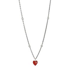 This is an authentic GUCCI Sterling Silver Enamel Interlocking G Heart Necklace Red. The necklace is crafted of sterling silver and features a red heart pendant on a polished chain with cutout G motifs throughout. Gucci Heart Necklace, Heart Necklace Red, Red Heart Pendant, Gucci Jewelry, Necklace Red, Silver Enamel, Red Heart, Heart Necklace, Sterling Silver Necklaces