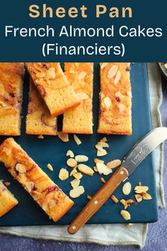 french almond cakes on a blue plate with a knife next to it and the words sheet pan