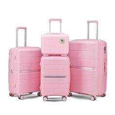 three pieces of pink luggage sitting next to each other