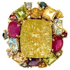 Bochic candy cocktail multi gem ring set in 18k gold & silver Center square cut Citrine 5 carat Multi gem, ruby, topaz, amethyst 4 carats This Ring is from the "Orient" traveling collection are the epitome of elegance and versatility. It offers a perfect blend of day to night and swimwear to evening wear, allowing you to effortlessly transition between different occasions and outfits. Wearing these spectacular oriental-style ring will undoubtedly make you the center of attention. It addw a touch Luxury Multi-stone Yellow Gemstones, Luxury Yellow Multi-stone Gemstones, Luxury Yellow Multi-stone Jewelry, Luxury Yellow Sapphire Multi-stone Ring, Yellow Gold Multi-stone Rings For Party, Multi-stone Yellow Sapphire Jewelry Gift, Multi Gem Ring, Candy Cocktails, Gem Ruby