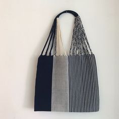 These versatile totes are handwoven by artisans in Chiapas, Mexico on a backstrap loom. Perfect for a beach day, the farmer's market, or as an everyday purse! This bag is approx. 16" wide x 26" tall with the strap. Due to the handmade nature, height and width of bag can vary up to 10% and product and color may vary from product photo. Hammock Bag, Backstrap Loom, Everyday Purse, Farmer's Market, Nantucket, Kids Wear, Beach Day, Hammock, Handmade Natural