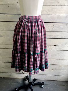 "50s red green plaid peasant skirt 2 tiers with green rick rack trim Full circle skirt Handmade Waist 26\" Length 25\" Width at hem 166\" (measured flat and doubled) Condition - very good vintage" Plaid Tiered Skirt With Ruffles, Plaid Tiered Ruffled Skirt, Vintage Green Tiered Skirt, Vintage Plaid Cotton Skirt, Plaid Ruffled Cotton Skirt, Plaid Cotton Skirt With Ruffles, Hair Grower, Peasant Skirt, Peignoir Sets