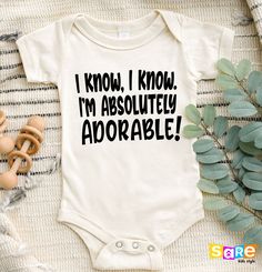 "Adorable Baby Onesie®, Funny Baby Outfit, Baby Shower Gift, Cute Baby Clothes, Funny Baby Onesie®, Funny Kids T-Shirt, Gift for Cute Newborn, Cute Natural Baby Onesie®, Vintage Bodysuit, Cute Natural Baby Onesie®, Newborn Baby Gift, Funny Tees, Mommy's Girl Shirt, Cute Baby Bodysuit, Funny Shirt for Girls, Toddler Girl's Shirt, Natural Newborn Girl Shirt, Cute Baby Clothes, Gift for Newborn, Babyshower Gift, Babyshower Shirt, Newborn Girl Gift Welcome to SareKidsStyle! HOW TO ORDER * Please review all the information provided before placing an order. 1. Select the style and size using the drop-down menu. 2. Select color 3. [APPLICABLE ONLY ON CERTAIN LISTINGS] Follow the instructions to fill out the \"Add your personalization\" option, e.g., specifying custom sayings or selecting design c White Onesie With Funny Text For Birthday, Baby Clothes Funny, Vintage Bodysuit, Funny Onesie, Funny Baby Onesie, Outfit Baby Shower, Natural Newborn, Cute Newborn, Funny Baby Clothes