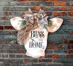 a brick wall with a sign that says,'bliss our home'on it