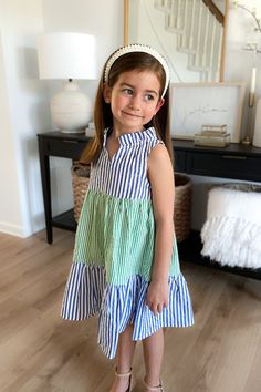 We love our best-selling girl's Annika dress with a ruffle neck, now in the most adorable spring Seersucker Color Block. FAVORITE FEATURES: Knee Length Babydoll Dress Tiered Skirt Sleeveless Ruffle Neck Sewing Baby Clothes, Striped Dress Summer, Baby Dress Design, Kids Summer Fashion, School Dresses, Check Dress, Girls Stripes, Frock Design, Dresses Kids Girl