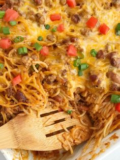 a casserole dish with meat, cheese and vegetables