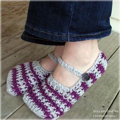 a woman's feet wearing crocheted slippers