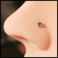 "If you're reaching for tiny and tasteful with a pop of color, this amethyst nose stud is it. One of my bestsellers for a reason, I hand craft these in nickel free sterling silver to order. *2mm (1/16\") genuine amethyst gemstone *nickel free sterling silver << How to pick your gauge and end style >> {{ GAUGE }} is the thickness of the part that goes through your piercing 20G is about the thickness of a regular earring post 18G is thicker than 20G 22G is thinner than 18G and 20G 24G Nose Pin Indian, Silver Nose Stud, Cute Piercings, Nose Pin, Nose Jewelry, Earring Post, Hand Craft, Nose Ring Stud, Stud Set