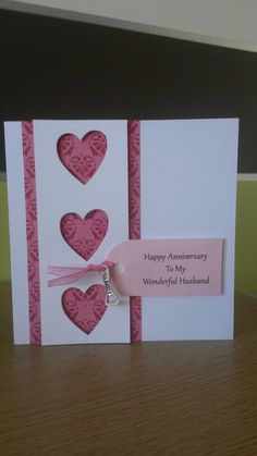 a card with two hearts attached to it