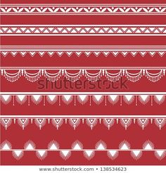 a red and white pattern with fringes