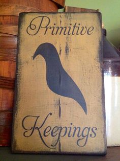 primitive keeping sign on shelf next to basket