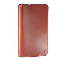 ∙ Checkbook wallet with pen loop ∙ Carry cash, cards, and store tags ∙ Expands and conforms with use ∙ Secure mag-snap button ∙ Solid metal hardware Bifold Card Holder With Pen Slots For Everyday Use, Online Wallet, Mckinney Texas, Checkbook Wallet, Tan Cowhide, Slim Wallet, Handcrafted Leather, Solid Metal, Stitch Design