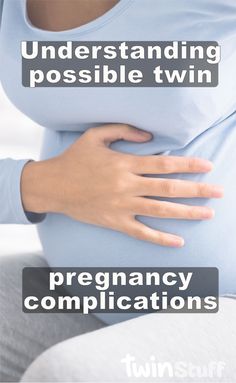 pregnant woman holding her stomach with the words, understanding possible twin pregnancy complitions